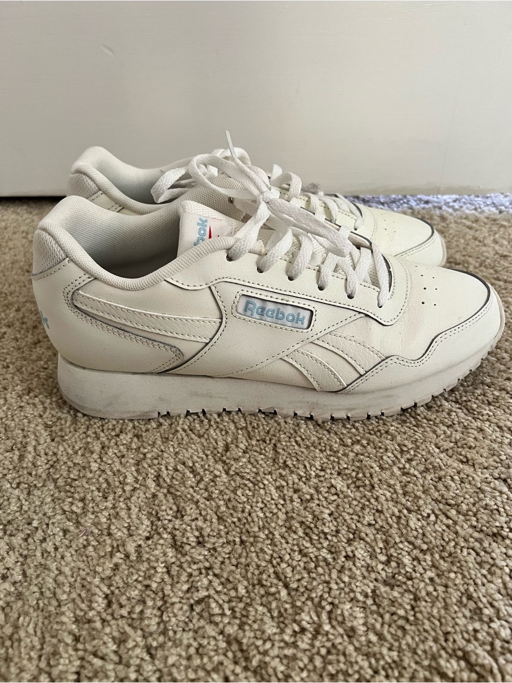 Reebok womens White Leather Sneakers with Light Blue Logo and memory tech insole